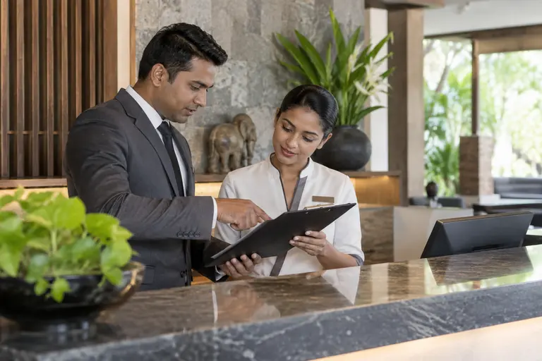 Hotel staff reviewing daily operations